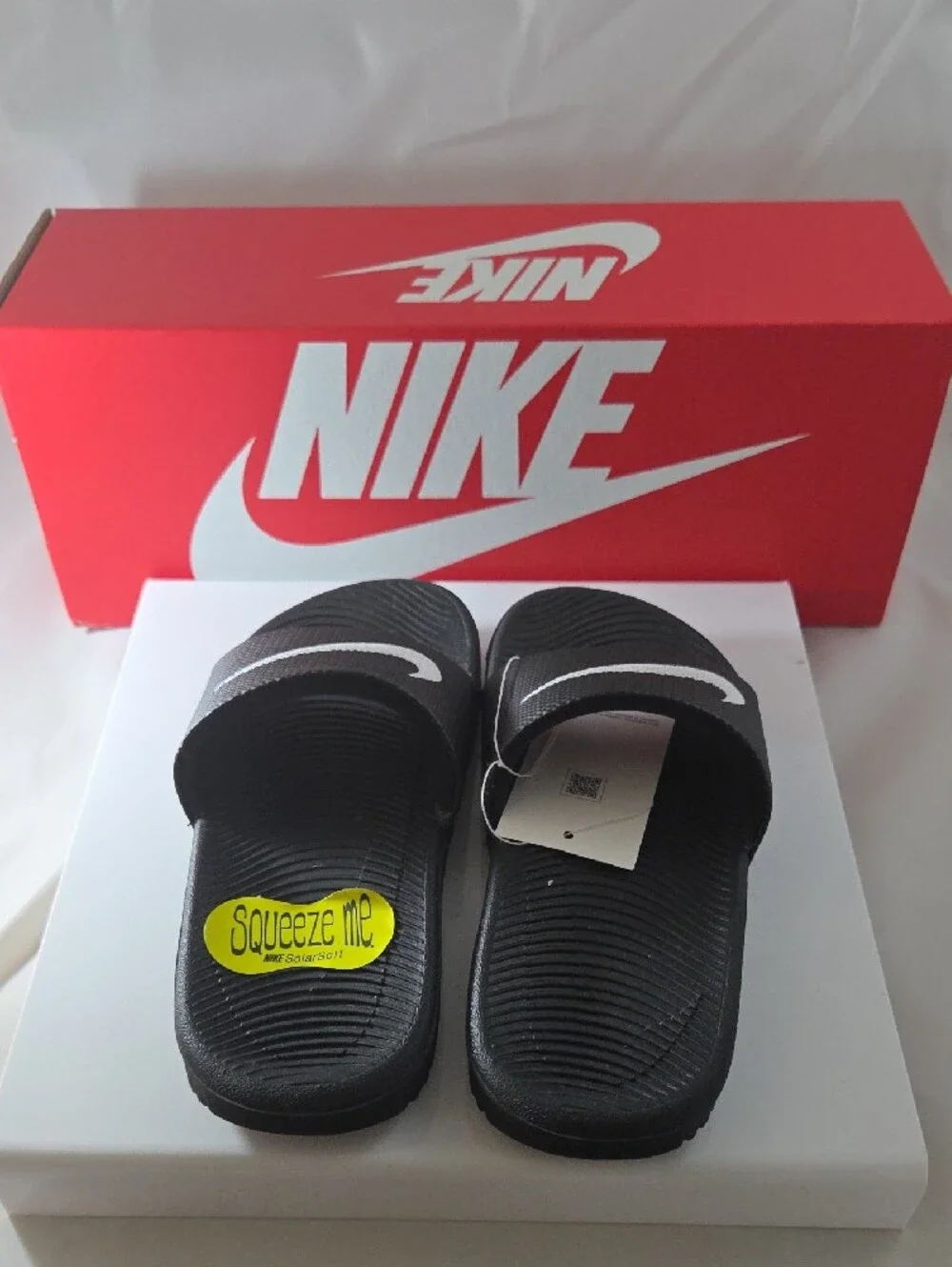 Nike Kids Black Slide Sandals with White Swoosh